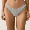Bikinis-Slip mit mittlerer Bedeckung, U-Ausschnitt und Jacquard-Stoff mit Polka-Dot-Muster Bikinis-Slip mit mittlerer Bedeckung, U-Ausschnitt und Jacquard-Stoff mit Polka-Dot-Muster