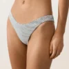 Bikinis-Slip mit mittlerer Bedeckung, U-Ausschnitt und Jacquard-Stoff mit Polka-Dot-Muster Bikinis-Slip mit mittlerer Bedeckung, U-Ausschnitt und Jacquard-Stoff mit Polka-Dot-Muster