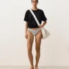 Bikinis-Slip mit mittlerer Bedeckung, U-Ausschnitt und Jacquard-Stoff mit Polka-Dot-Muster Bikinis-Slip mit mittlerer Bedeckung, U-Ausschnitt und Jacquard-Stoff mit Polka-Dot-Muster