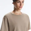 Boxy T-Shirt aus Baumwollmischung mit kurzen Ärmeln und Slogan Boxy T-Shirt aus Baumwollmischung mit kurzen Ärmeln und Slogan