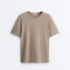 Boxy T-Shirt aus Baumwollmischung mit kurzen Ärmeln und Slogan Boxy T-Shirt aus Baumwollmischung mit kurzen Ärmeln und Slogan