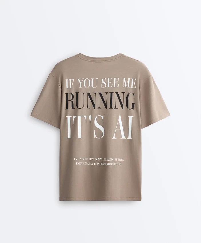 Boxy T-Shirt aus Baumwollmischung mit kurzen Ärmeln und Slogan Boxy T-Shirt aus Baumwollmischung mit kurzen Ärmeln und Slogan