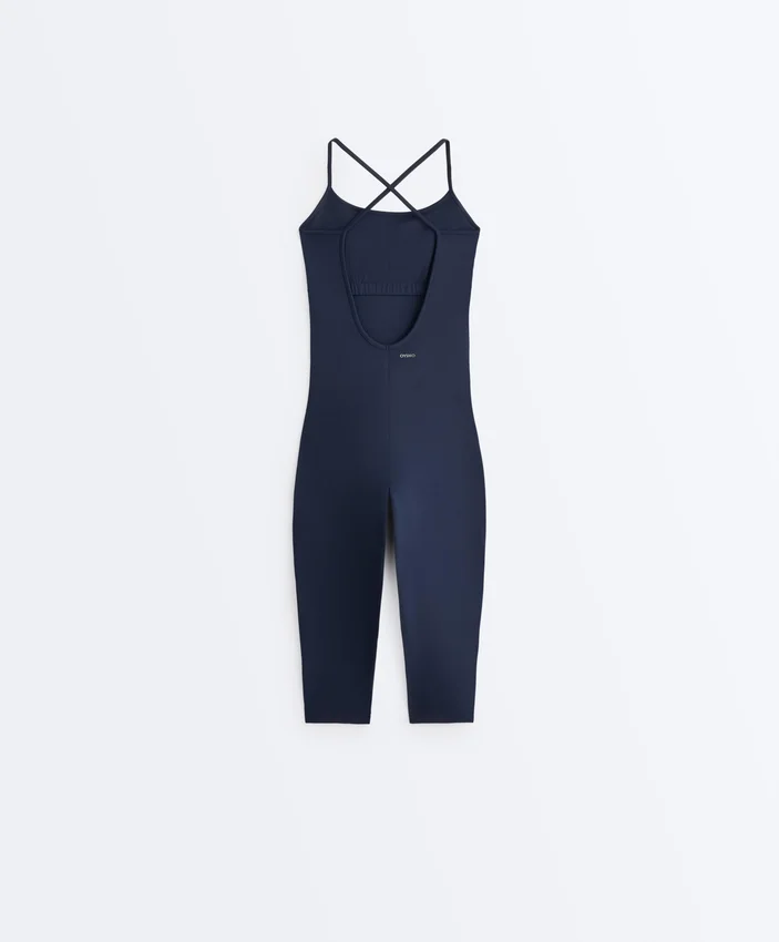 Comfortlux Capri-Jumpsuit mit gekreuzten Trägern am Rücken Comfortlux Capri-Jumpsuit mit gekreuzten Trägern am Rücken