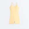 Comfortlux Kurzer Jumpsuit mit Knotendetail Comfortlux Kurzer Jumpsuit mit Knotendetail