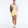 Comfortlux Kurzer Jumpsuit mit Knotendetail Comfortlux Kurzer Jumpsuit mit Knotendetail