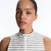 Gestreiftes, ärmelloses T-Shirt mit halbem Reissverschluss Gestreiftes, ärmelloses T-Shirt mit halbem Reissverschluss