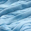 Gewaschenes, kurzes T-Shirt aus Strick mit Zopfmuster und Trägern