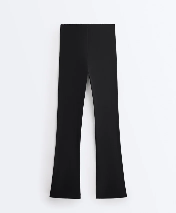Hoch geschnittene Compressive-Hose mit ausgestelltem Bein Hoch geschnittene Compressive-Hose mit ausgestelltem Bein