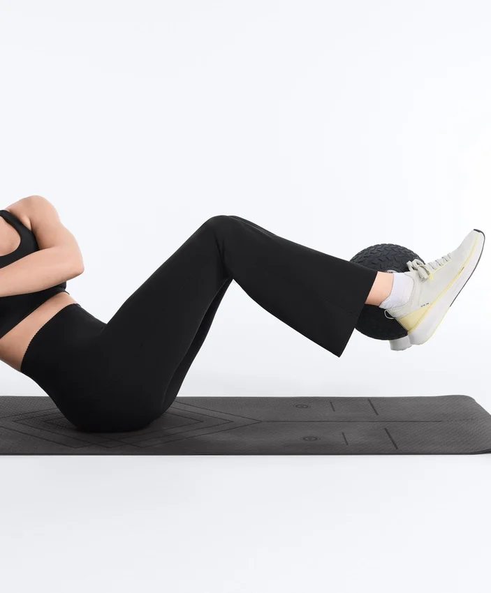 Hoch geschnittene Compressive-Hose mit ausgestelltem Bein Hoch geschnittene Compressive-Hose mit ausgestelltem Bein