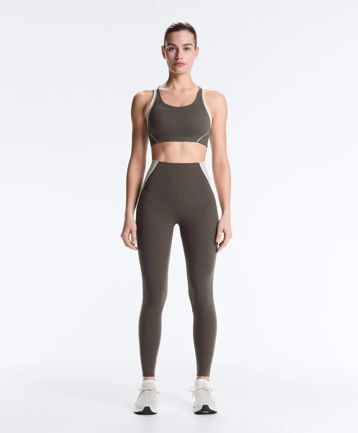 Sport-BH mit festem Halt, Compressive-Wirkung und reflektierenden Details Sport-BH mit festem Halt, Compressive-Wirkung und reflektierenden Details