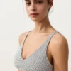 Jacquard-Halter-Bikinioberteil mit Polka-Dots Jacquard-Halter-Bikinioberteil mit Polka-Dots