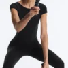 Langer Compressive Jumpsuit mit kurzen Ärmeln Langer Compressive Jumpsuit mit kurzen Ärmeln