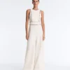 Langer Piqué-Jumpsuit mit Paspelierung aus Baumwolle Langer Piqué-Jumpsuit mit Paspelierung aus Baumwolle