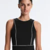 Langer Piqué-Jumpsuit mit Paspelierung aus Baumwolle Langer Piqué-Jumpsuit mit Paspelierung aus Baumwolle