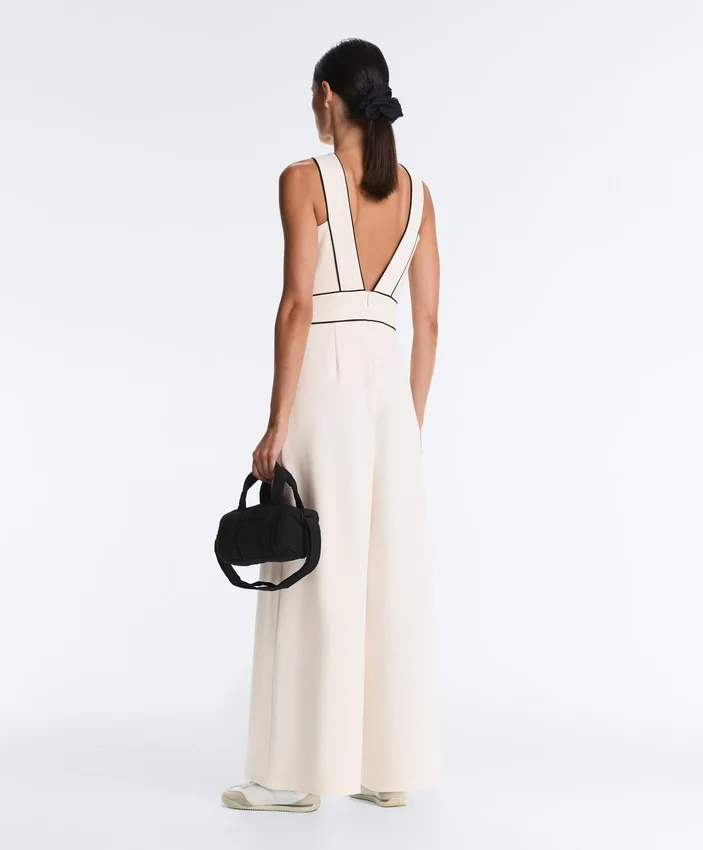 Langer Piqué-Jumpsuit mit Paspelierung aus Baumwolle Langer Piqué-Jumpsuit mit Paspelierung aus Baumwolle