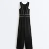 Langer Piqué-Jumpsuit mit Paspelierung aus Baumwolle Langer Piqué-Jumpsuit mit Paspelierung aus Baumwolle