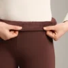 Nahtlose Bootcut-Hose mit hoher Taille und besonders warmer Isolierung Nahtlose Bootcut-Hose mit hoher Taille und besonders warmer Isolierung