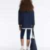 Pullover aus 100 % Baumwolle mit Zopfmuster und V-Ausschnitt