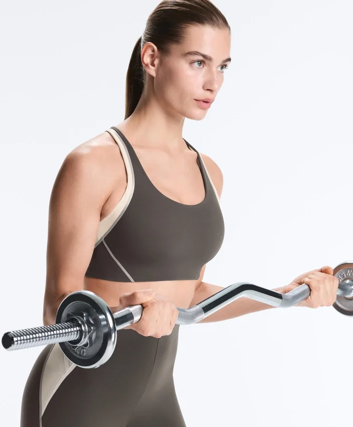 Sport-BH mit festem Halt, Compressive-Wirkung und reflektierenden Details Sport-BH mit festem Halt, Compressive-Wirkung und reflektierenden Details