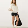 Sweatshirt mit halbem Reissverschluss, Fronttasche, aus einer Mischung aus Lyocell und 24 % Leinen Sweatshirt mit halbem Reissverschluss, Fronttasche, aus einer Mischung aus Lyocell und 24 % Leinen