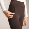 Warme, hoch geschnittene, knöchellange Leggings mit Taschen, 70 cm