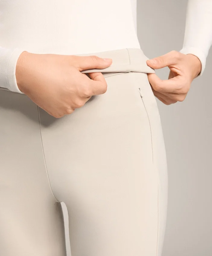 Warme, hoch geschnittene, knöchellange Leggings mit Taschen, 70 cm Warme, hoch geschnittene, knöchellange Leggings mit Taschen, 70 cm