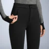 Wasserabweisende, durchgehende, ausgestellte Stretch-Skihose Wasserabweisende, durchgehende, ausgestellte Stretch-Skihose