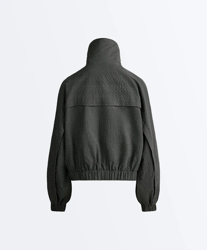 Wasserabweisende Nylon-Jacke im Karomuster Wasserabweisende Nylon-Jacke im Karomuster