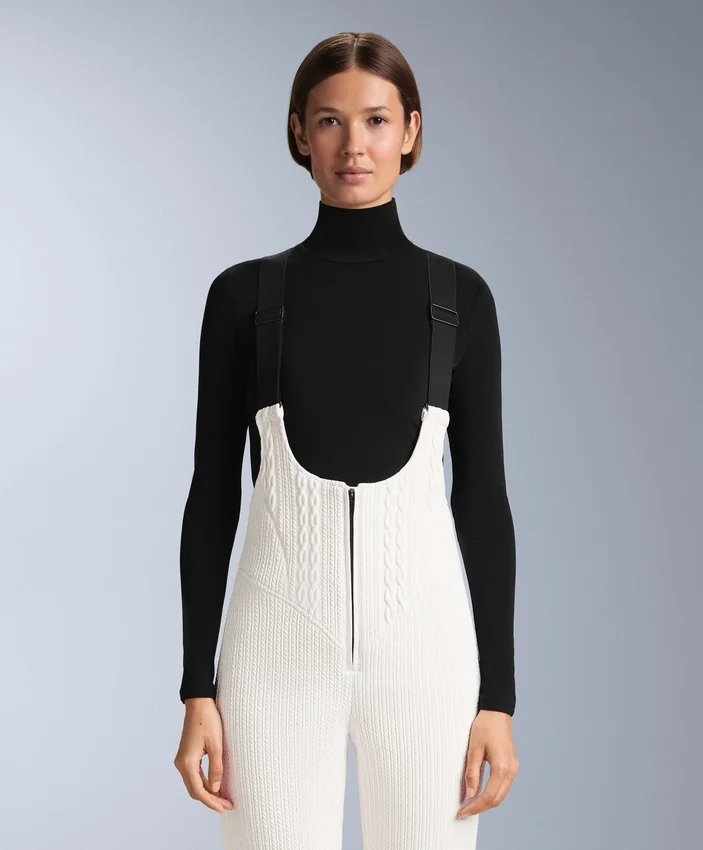 Wasserabweisende Ski-Latzhose mit ausgestelltem Bein Wasserabweisende Ski-Latzhose mit ausgestelltem Bein