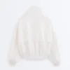 Wasserabweisende Trainingsjacke mit hohem Kragen Wasserabweisende Trainingsjacke mit hohem Kragen