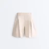 Weit geschnittene, gestreifte Bermudashorts mit Falten Weit geschnittene, gestreifte Bermudashorts mit Falten