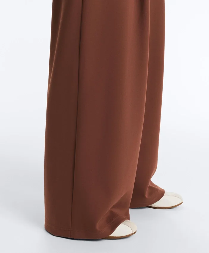Weit geschnittene Hose mit hoher Taille aus Baumwollpiqué Weit geschnittene Hose mit hoher Taille aus Baumwollpiqué