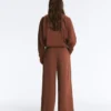 Weit geschnittene Hose mit hoher Taille aus Baumwollpiqué Weit geschnittene Hose mit hoher Taille aus Baumwollpiqué
