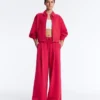 Weit geschnittene Piqué-Hose mit Falten und Baumwolle Weit geschnittene Piqué-Hose mit Falten und Baumwolle