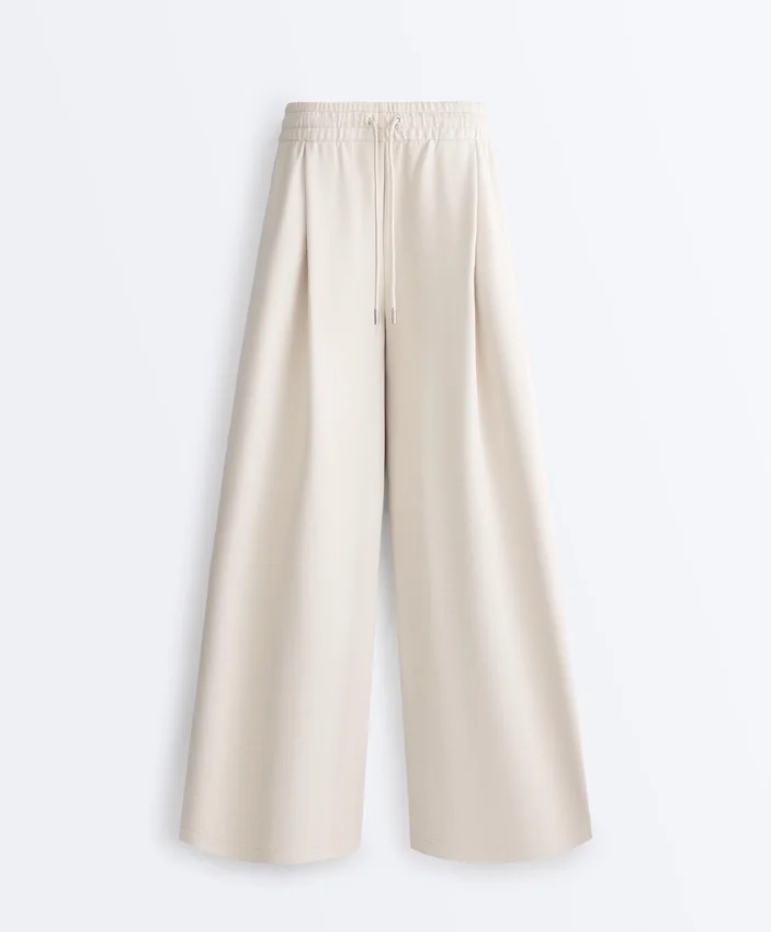 Weit geschnittene Piqué-Hose mit Falten und Baumwolle Weit geschnittene Piqué-Hose mit Falten und Baumwolle