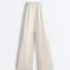 Weit geschnittene Piqué-Hose mit Falten und Baumwolle Weit geschnittene Piqué-Hose mit Falten und Baumwolle