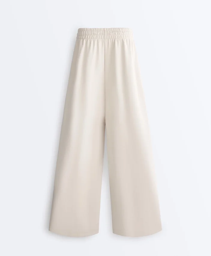 Weit geschnittene Piqué-Hose mit Falten und Baumwolle Weit geschnittene Piqué-Hose mit Falten und Baumwolle
