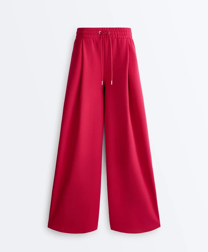 Weit geschnittene Piqué-Hose mit Falten und Baumwolle Weit geschnittene Piqué-Hose mit Falten und Baumwolle